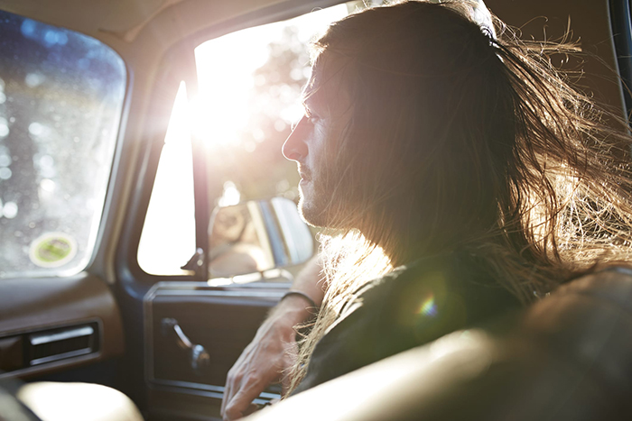 man in car