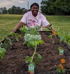 Community Member In Garden