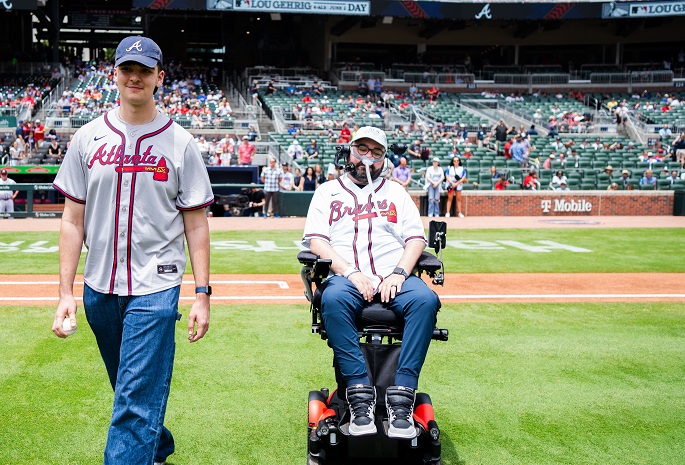 emory als center patient justin and son at braves als game