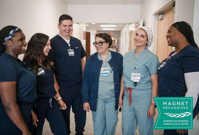 group of 6 emory healthcare nurses with magnet logo overlay