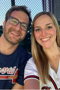 Melissa and her husband Garrett at a Braves game