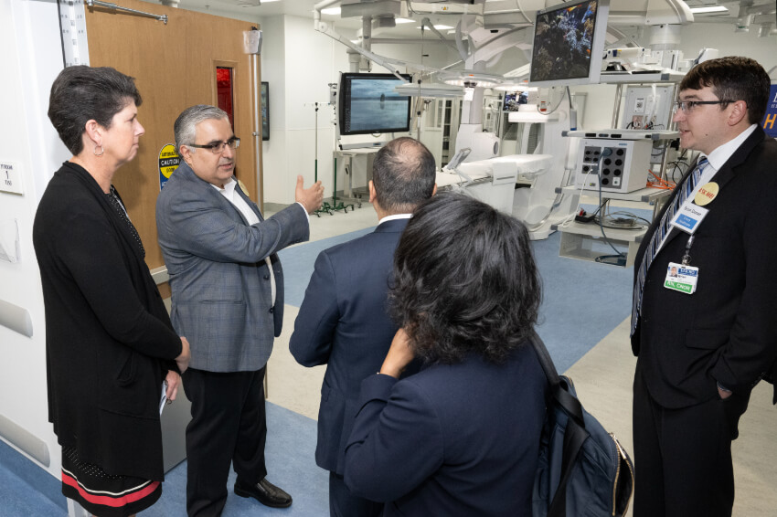 Cardiac surgeon Mani Daneshmand, MD, leads a tour through the new facilities