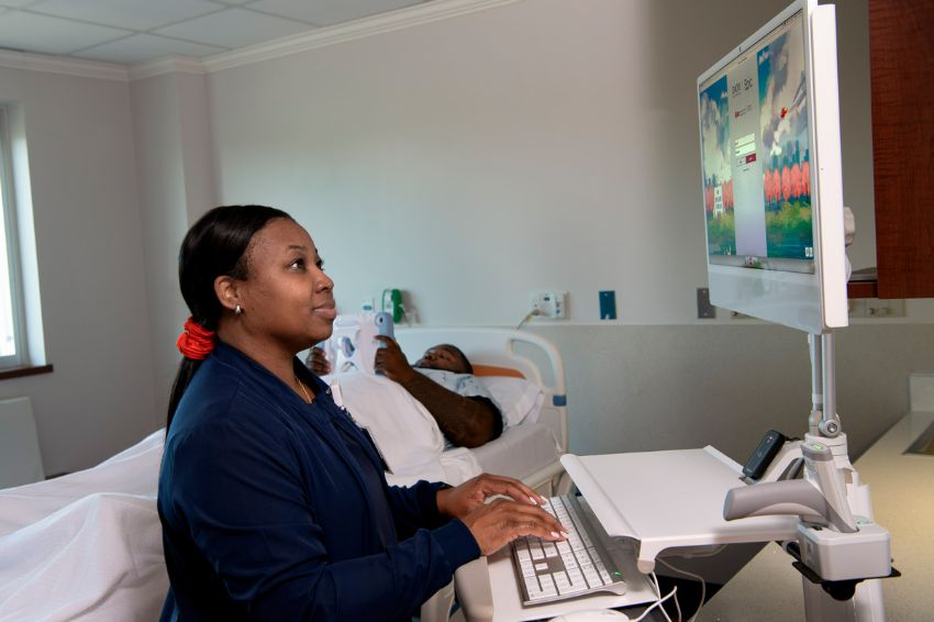 emory provider uses apple device in patient room