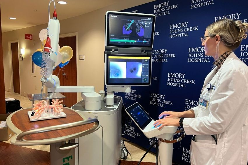 physician demonstrates ion robot at emory johns creek hospital