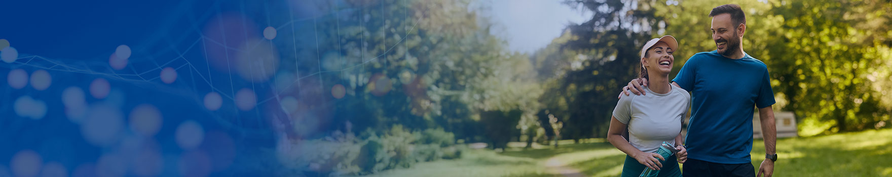 A young couple walking on a park