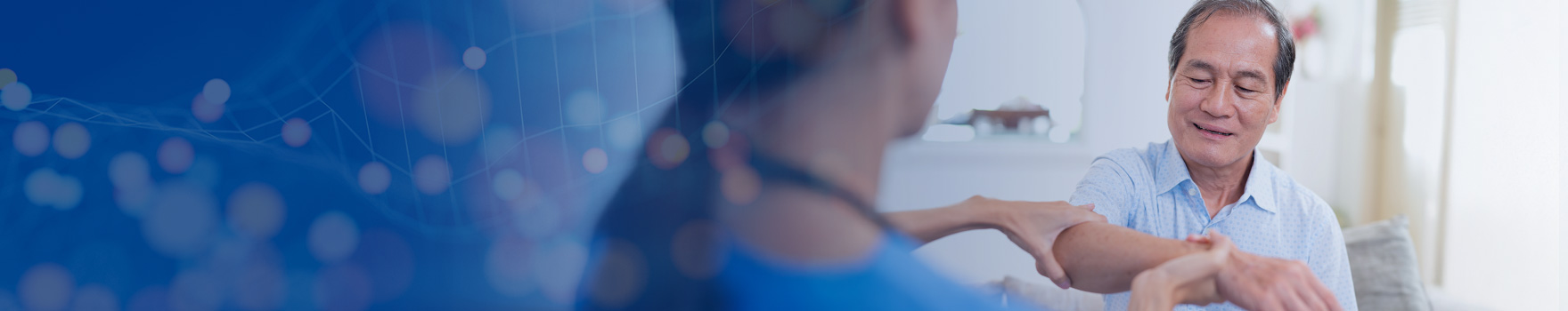nurse helping to stretch a man's arm