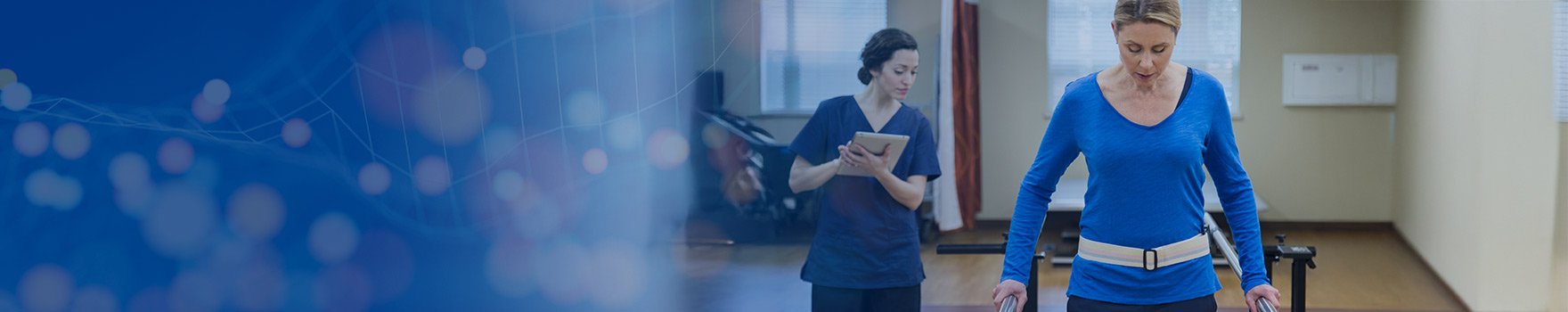 nurse monitoring woman practicing walking