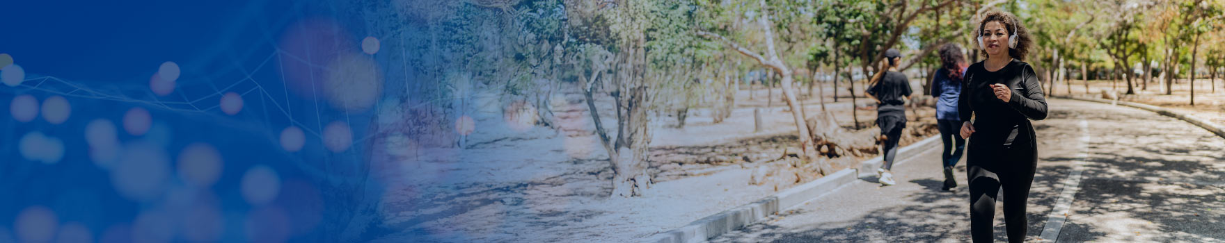 woman running on a trail with headphones on